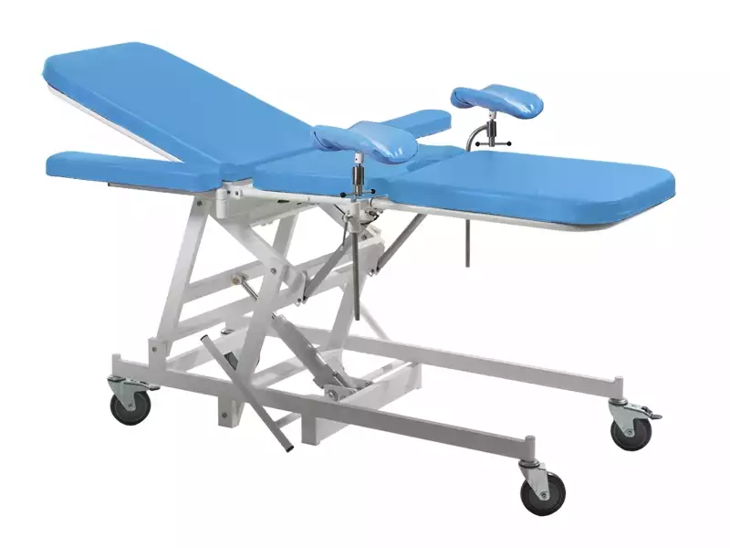 Стол перевязочный СПэ229-"МСК" с электроприводом, подголовником, тазовой секцией, дополнительной ножной секцией, опорами для ног